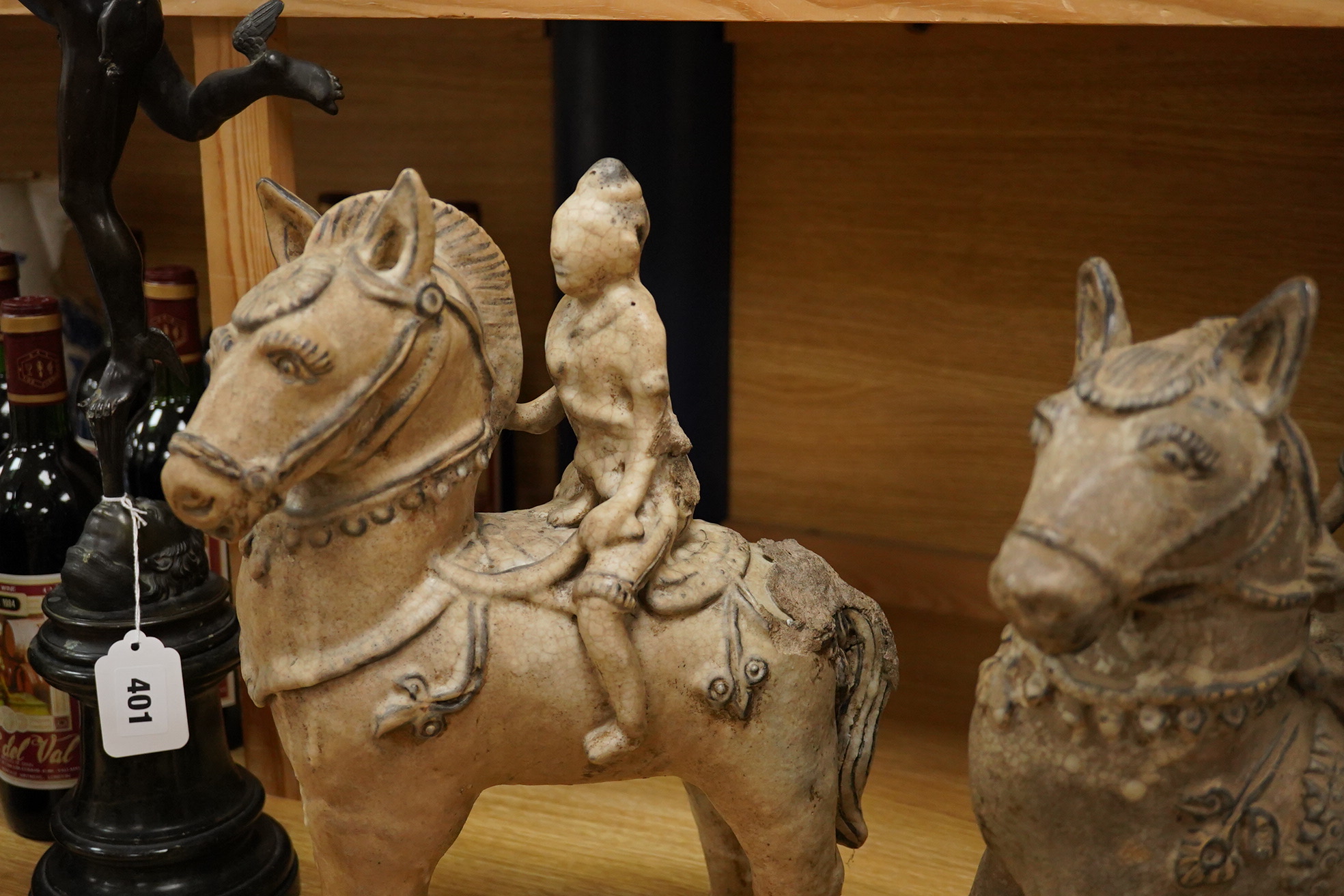 Two large Thai crackle glaze figures on horseback, 39cm high